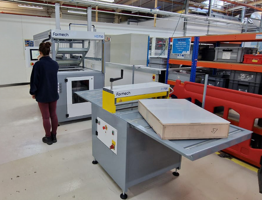 HD750 vacuum forming machine with a RP700 roller press